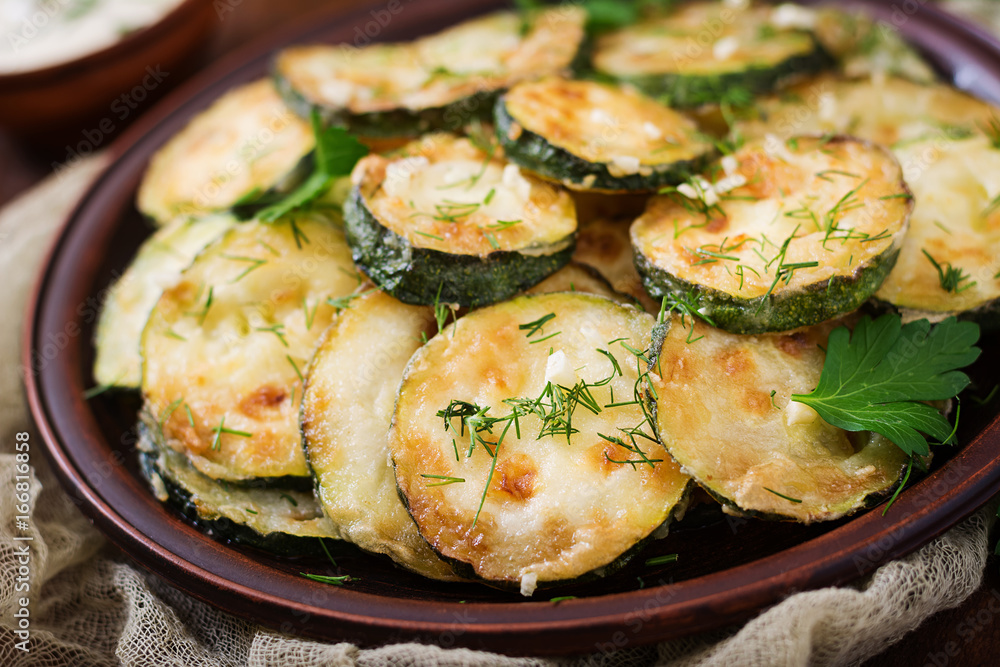 Fried zucchini with sauce, dill and garlic
