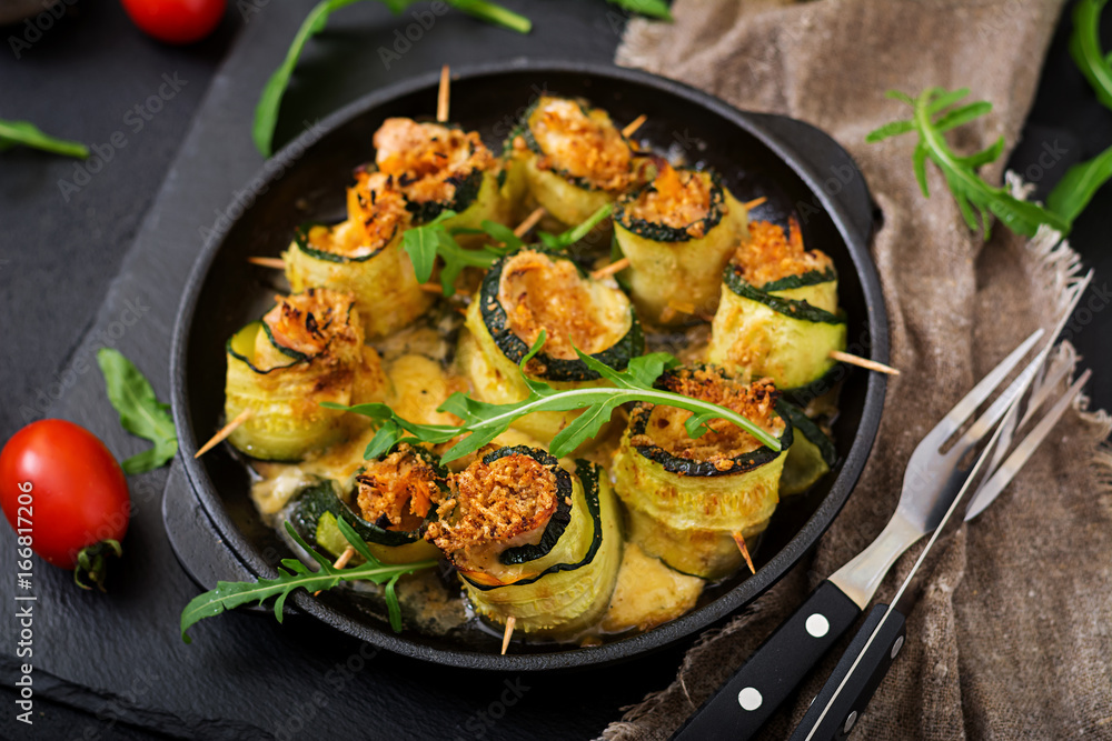 Baked zucchini rolls with cheese, carrot and chicken breast Baked zucchini rolls with cheese, carrot and chicken breast