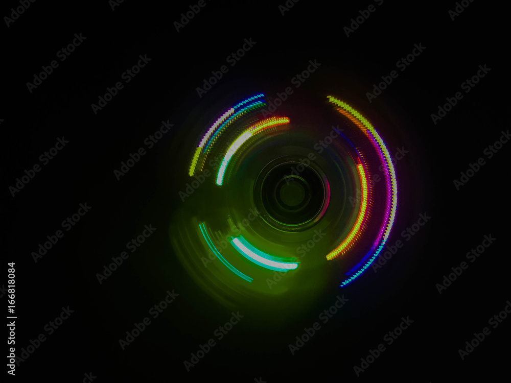 Colorful light neon circle in dark black background Colorful light neon circle in dark black background