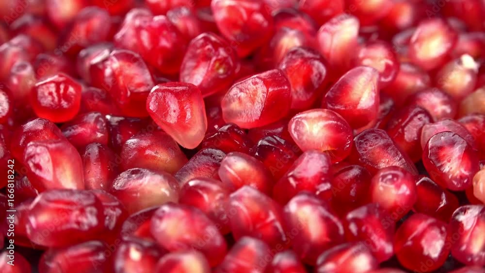 Pomegranate Seeds (rotating on a wooden plate; seamless loopable; 4K) Pomegranate Seeds (rotating on a wooden plate; seamless loopable; 4K)