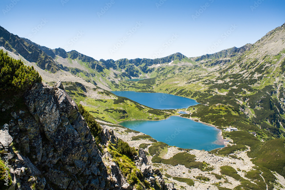 Tatras mountains, Valley of five ponds. View on mountains and two lakes. Trail to see eye from the mountain hostel in five ponds.  Five breathtaking mountain lakes in the High Tatras.