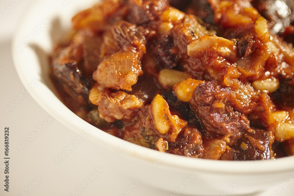 Caponata, a stew of eggplant, tomato, raisins and pine nuts, from Sicily, Italy Caponata, a stew of eggplant, tomato, raisins and pine nuts, from Sicily, Italy