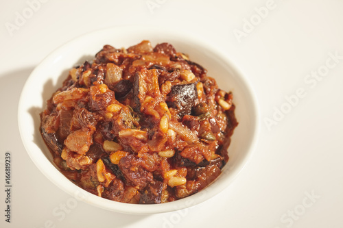 Caponata, a stew of eggplant, tomato, raisins and pine nuts, from Sicily, Italy