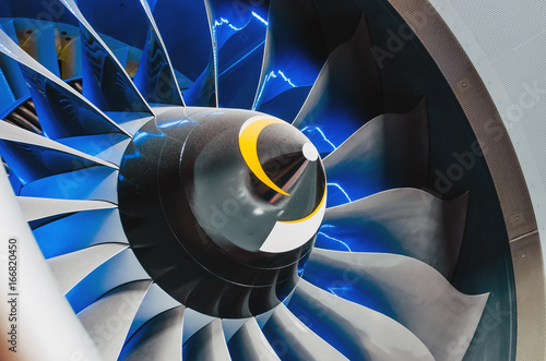 Airplane engine and blades with blue backlight close up