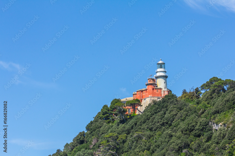 Lighthouse on the top of the mountain on the island of Palmaria, Liguria, Italy