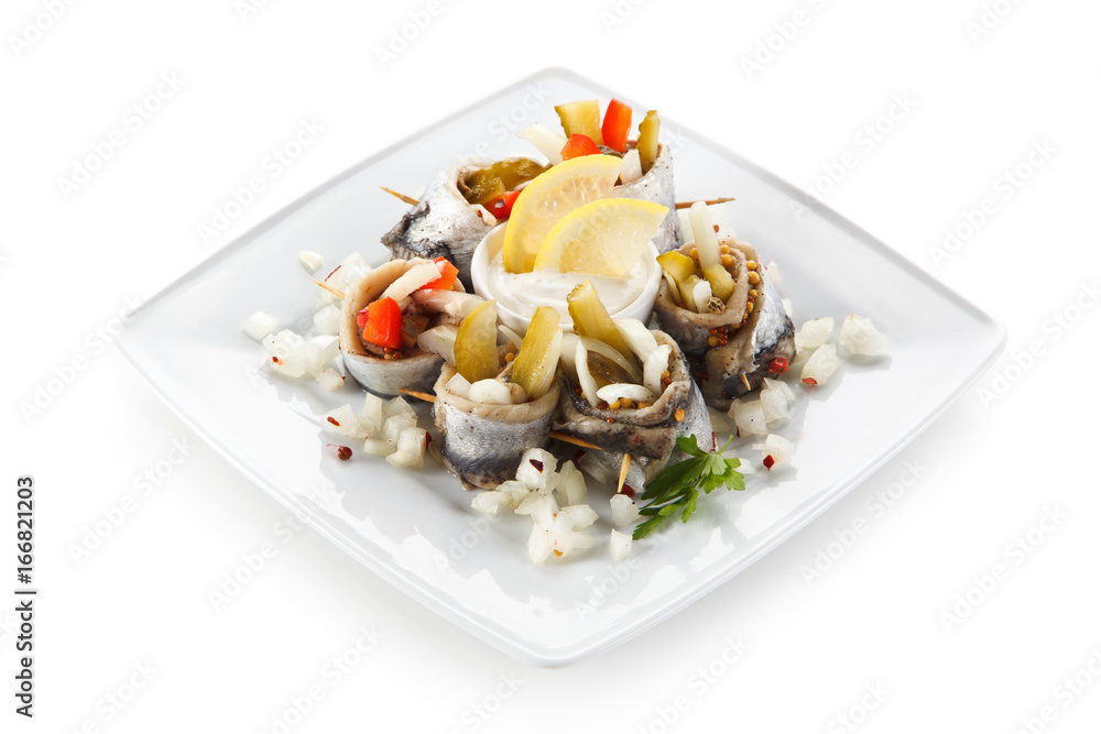 Marinated herring fillets on white background Marinated herring fillets on white background