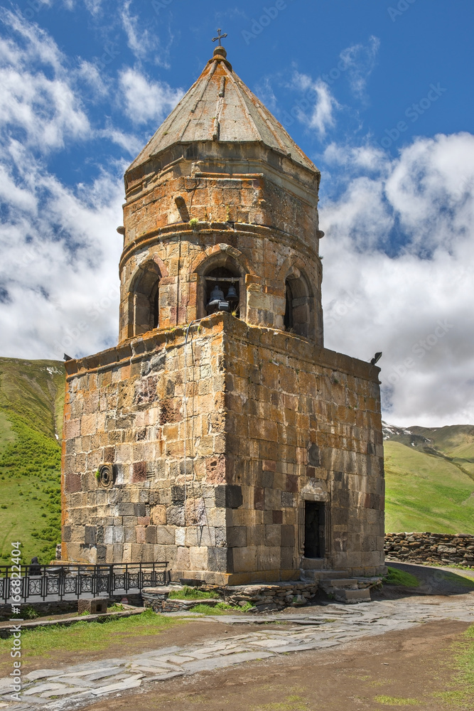 old bell tower, Gergeti Trinity Church (Tsminda Sameba), Holy Trinity Church near the village of Gergeti in Georgia, under Mount Kazbegi