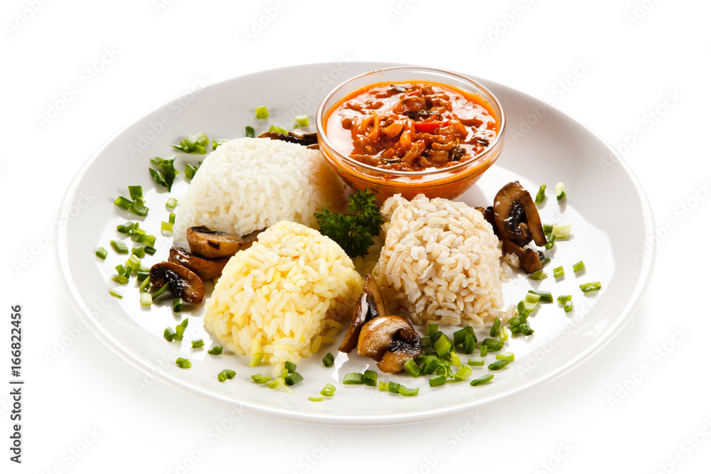 Rice dish with sauce on white background Rice dish with sauce on white background