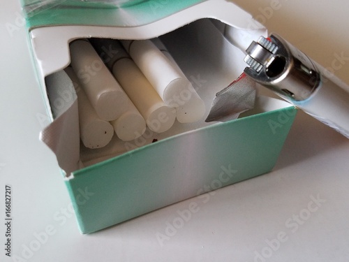 Box of menthol cigarettes and a lighter