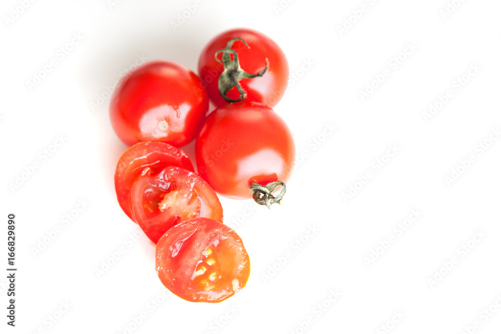 Fresh tomatoes on white background