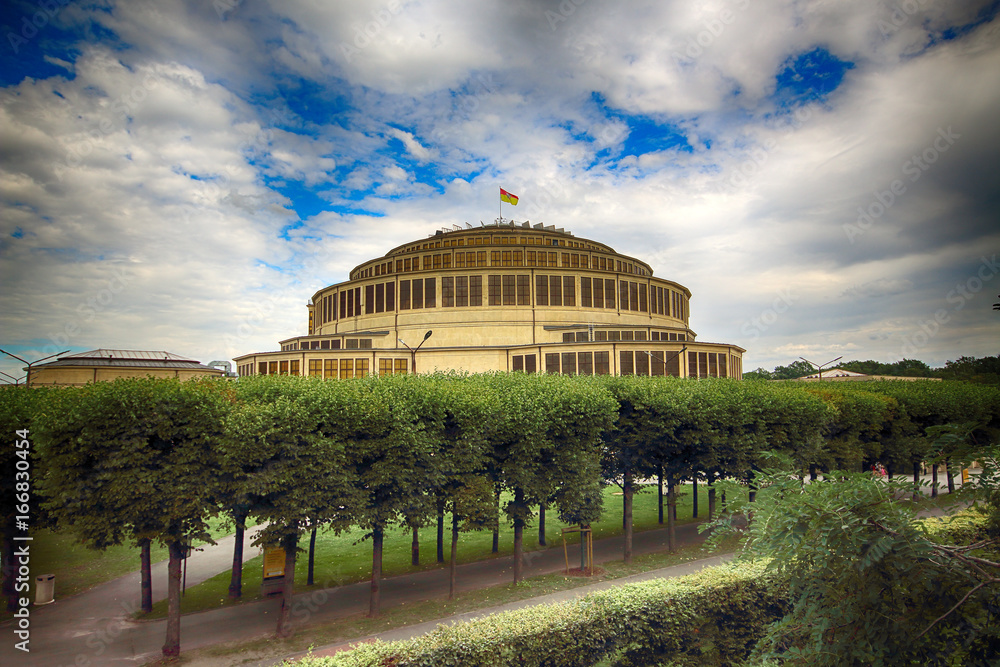 Fototapeta premium WROCLAW, POLAND - AUGUST 04, 2017: Centennial Hall in Wroclaw. The Hall’s inscription on UNESCO World Heritage List in 2006 emphasized the rank of this facility. Designed by Max Berg.