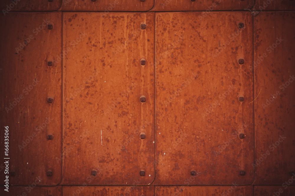 Old rusty metal background with rivets - grunge vintage texture