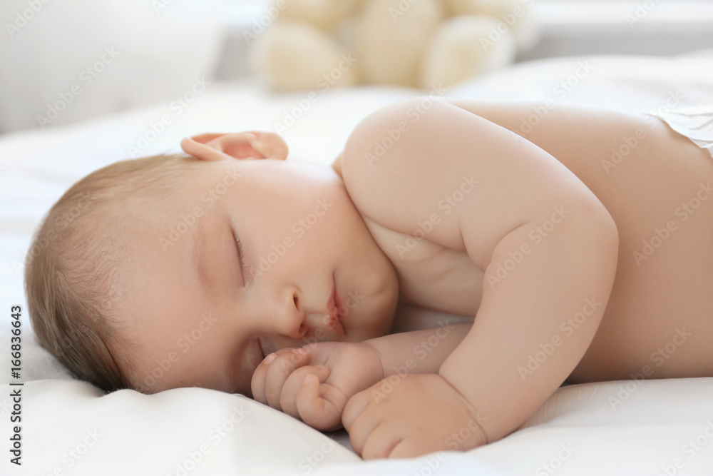 Cute little baby sleeping on bed at home Cute little baby sleeping on bed at home
