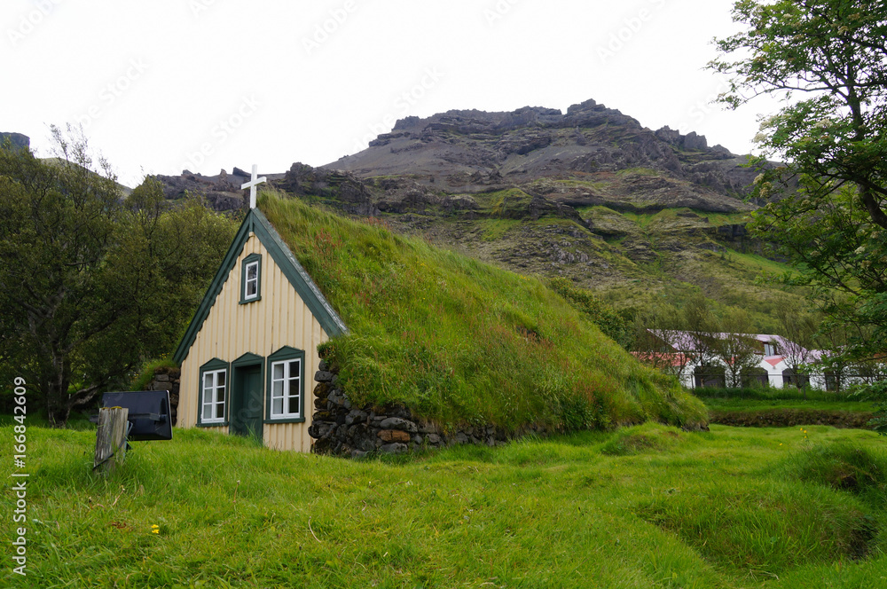 Hofskirkja church is a beautiful turf church in South-East Iceland.