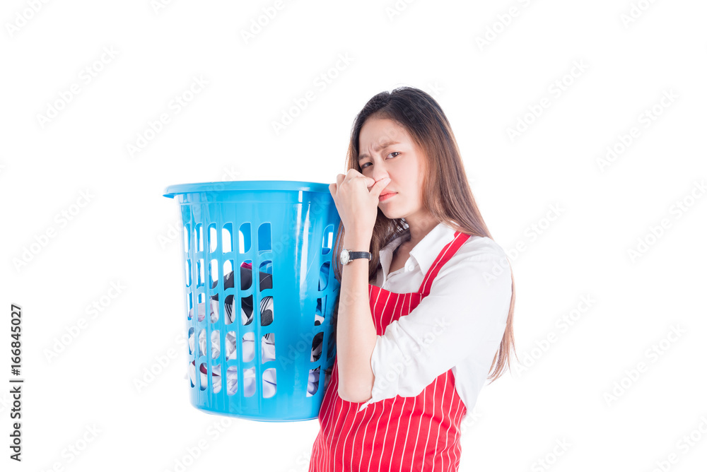 Tired beautiful asian woman wearing red apron and holding clothes basket Tired beautiful asian woman wearing red apron and holding clothes basket