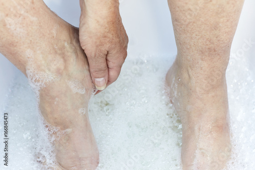 Middle Aged Woman's Feet in Water © Pamela Au