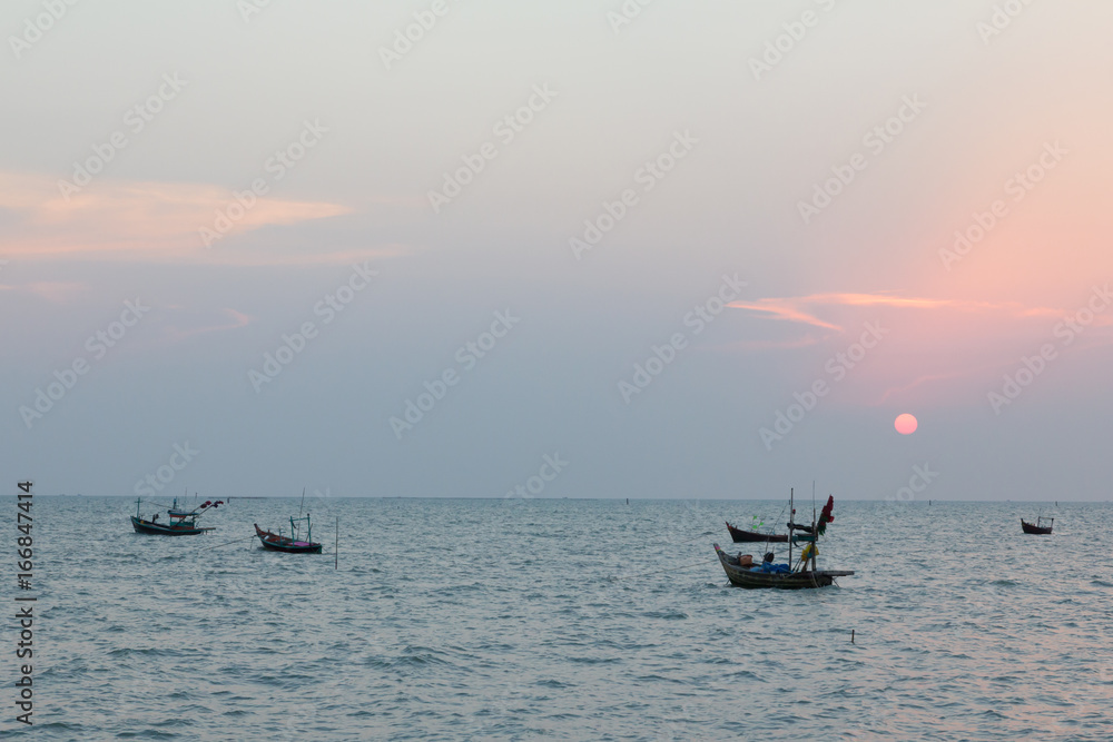 thai fishing boat on the sea after sunset
