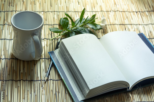 Table, Book, Coffee, idea, thinking, creative working in the morning.