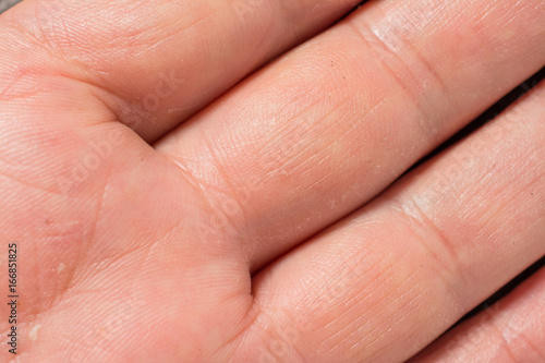 Texture of the skin with wrinkles on the body of mature male