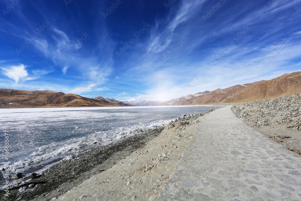 Tibet's snow-capped mountains, glacial lakes
