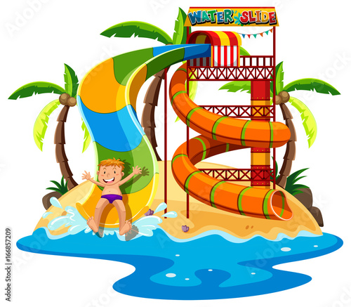 Little boy playing waterslide