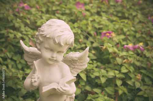 Cupid stucco in the garden