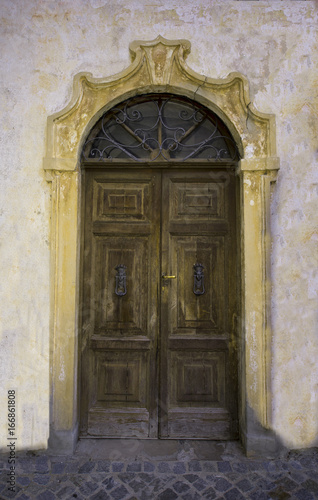 Old house door in Maccagno on Lake Maggiore - Maccagno, Lake Maggiore, Varese, Lombardy, Italy © karlo54