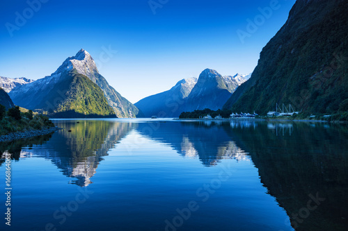 Mitre Peak at Milford Sound in south island, New Zealand in the morning in autumn. The mountian and the reflection in the sea 