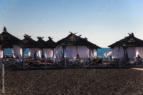 Summer restaurant on the sandy beach