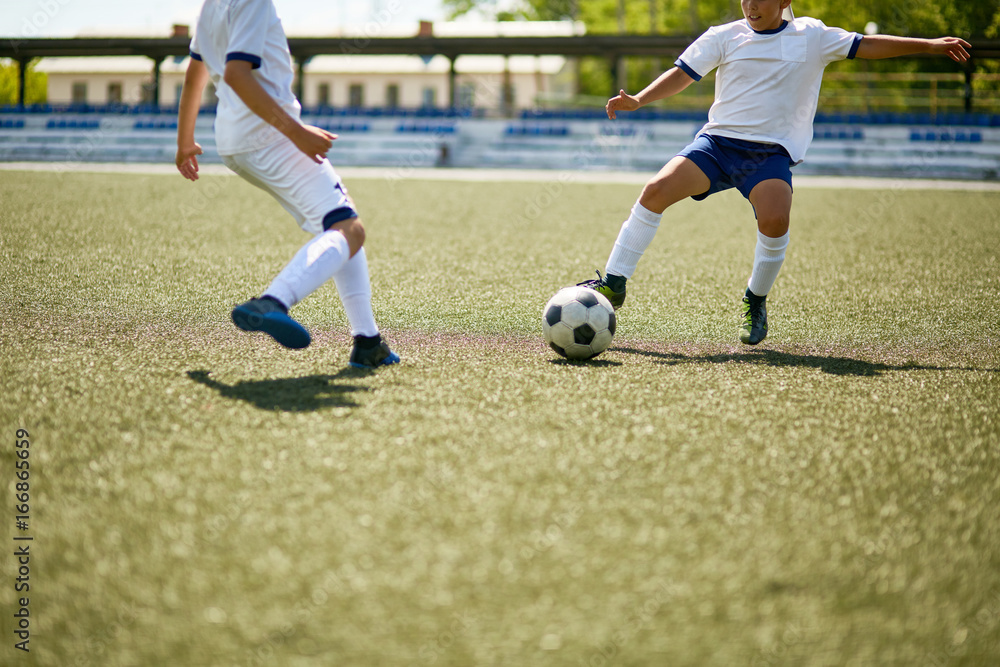 Obraz premium Boys Playing Football