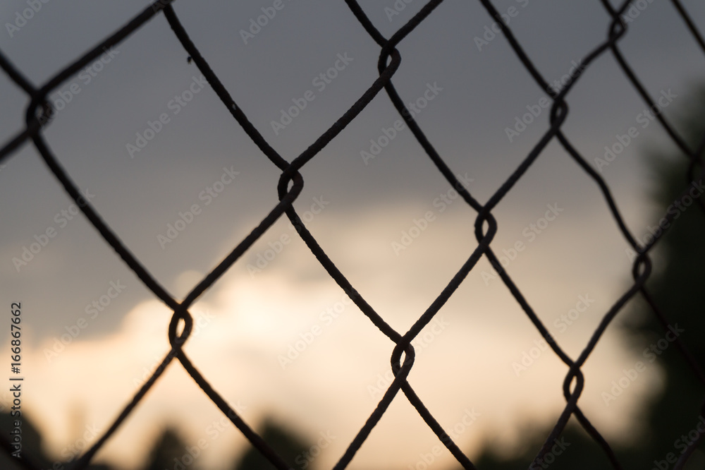 fence with sunset in background fence with sunset in background