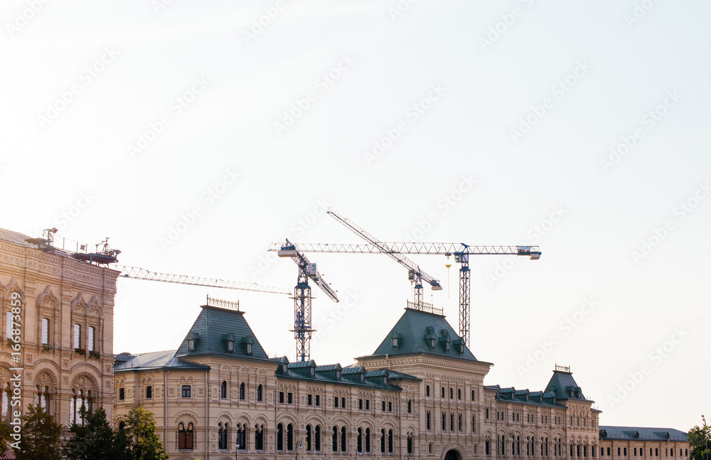 Tower crane in center of Moscow. Silhouette