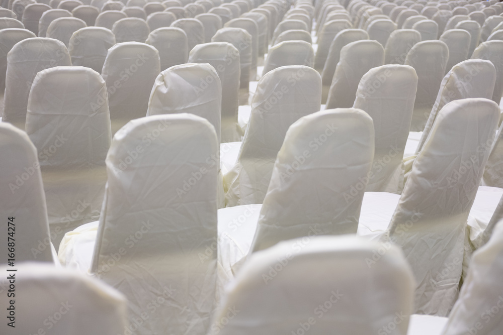 Obraz premium modern conference hall interior with white chairs. seminar room with empty seat. business event