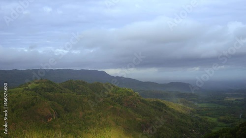 Time lapse footage of beautiful aerial landscape from the peak of Panguk Hill in Yogyakarta, Indonesia photo