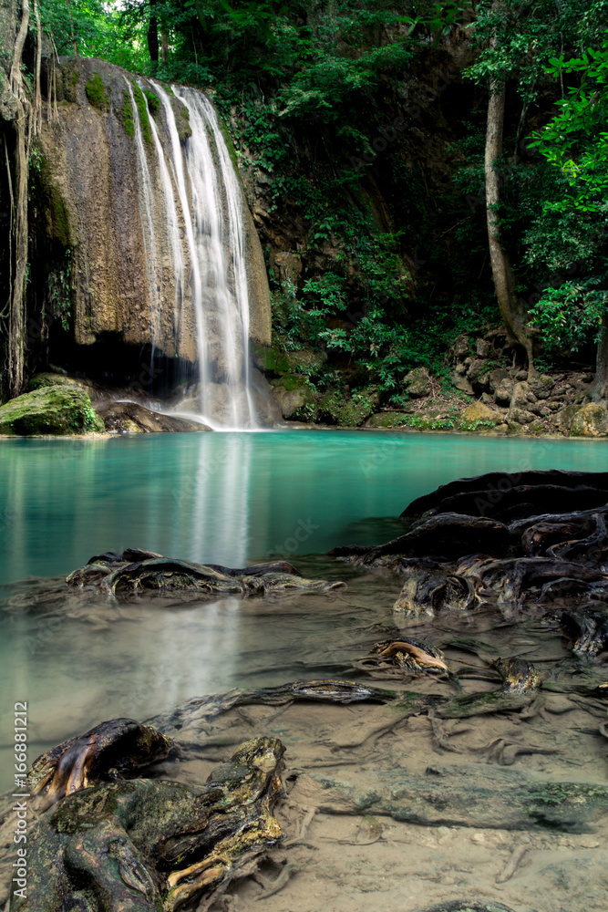 Obraz premium Teal and clear water of the Erawan Waterfall in Kanchanaburi, Thailand. 