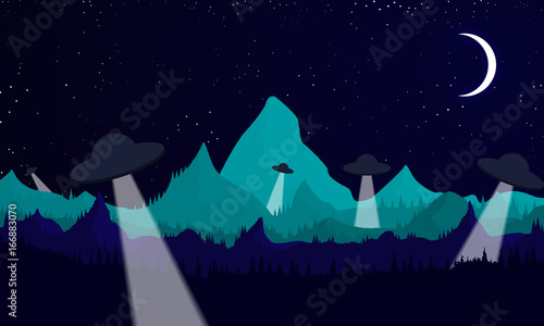 UFO on the background of the forest and mountains