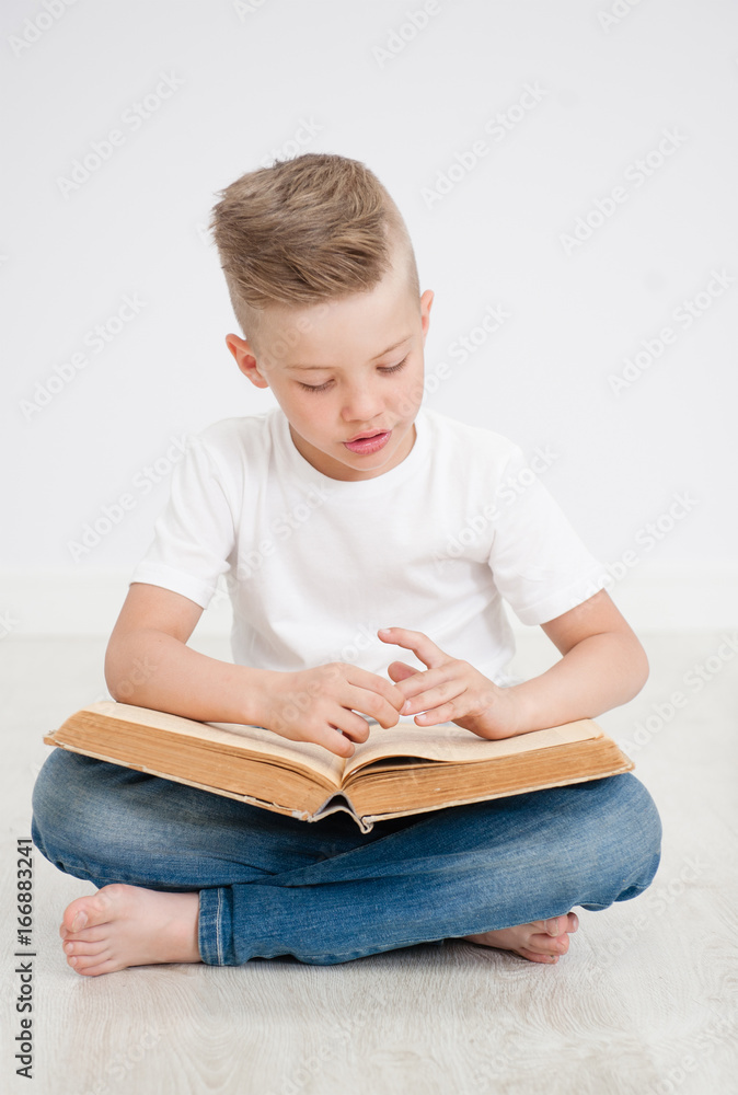 Child is reading a book Child is reading a book