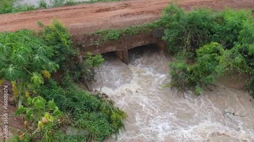 High angle video Water flows slowly from the drain.