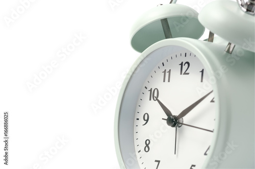 close-up pastel retro alarm clock or vintage alarm clock isolated on white background with clipping path