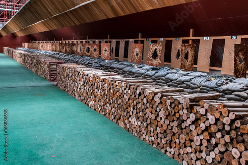 Indoor gun shooting of target range.