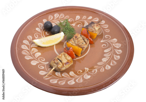 Sturgeon shish kebab with vegetables. photo