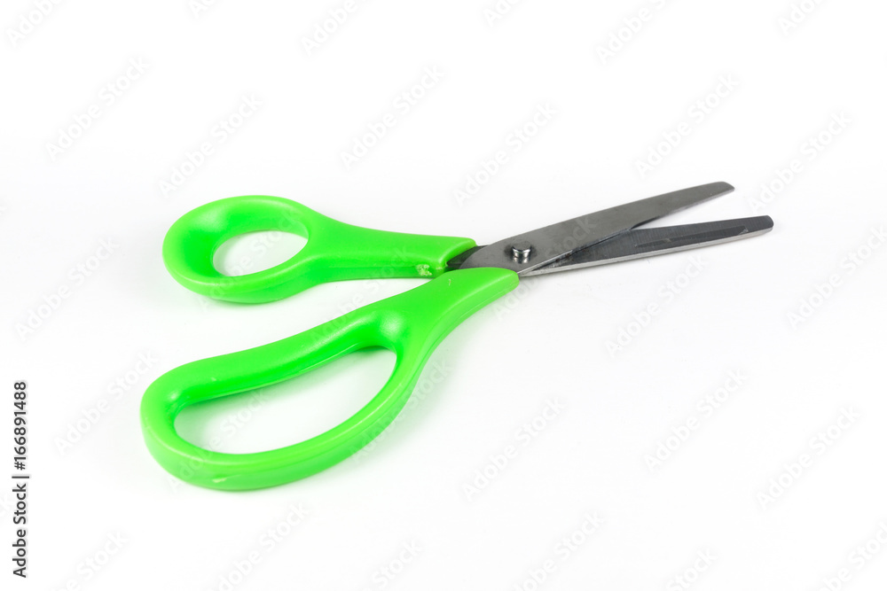Green scissors isolated on a white background. Green scissors isolated on a white background.