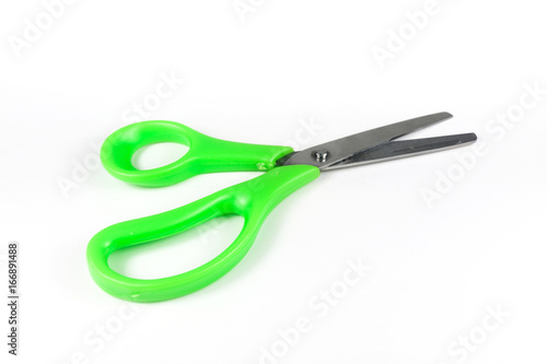 Green scissors isolated on a white background.