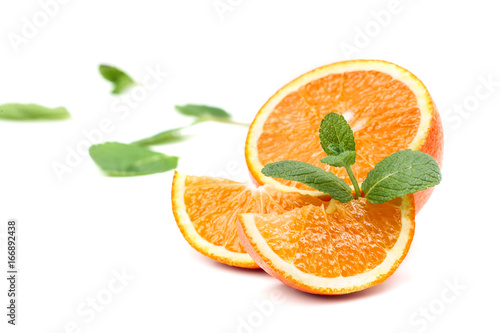 orange, orange slices and mint leaves © Oleksandr