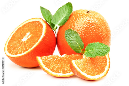 Fototapeta Naklejka Na Ścianę i Meble -  orange, orange slices and mint leaves