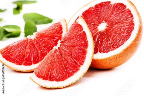 Grapefruit lobules on a white background