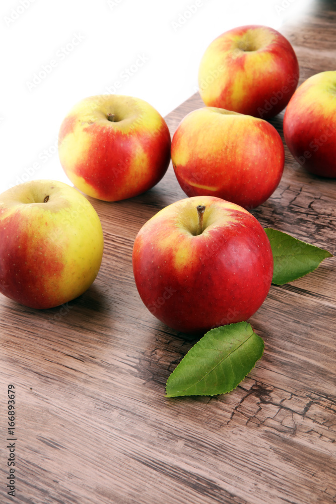 Ripe red apples on wooden background summer concept Ripe red apples on wooden background summer concept
