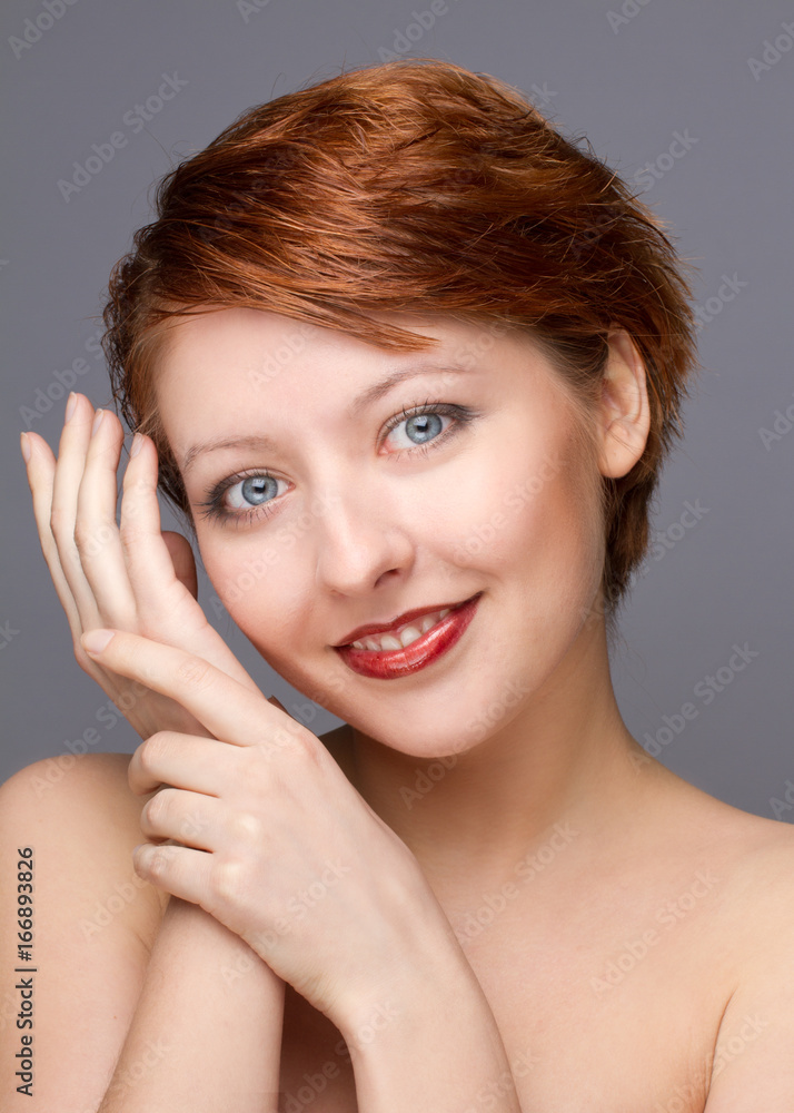 beauty portrait of young woman on gray beauty portrait of young woman on gray