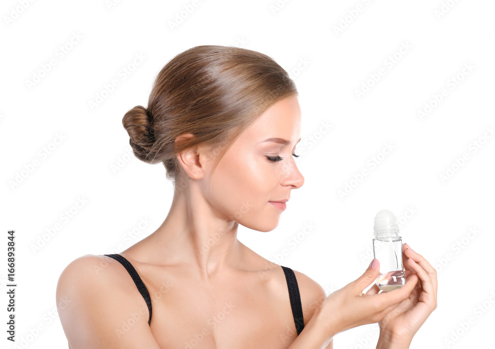Beautiful young woman with deodorant on white background Beautiful young woman with deodorant on white background