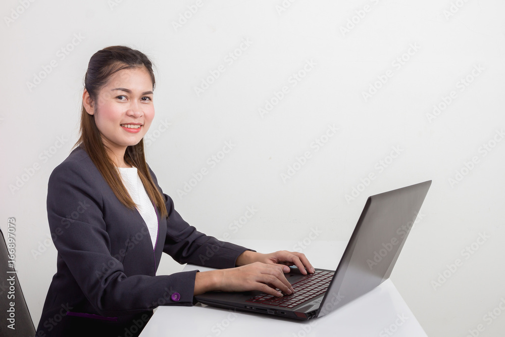 Asian businesswoman use of laptop computer. Asian businesswoman use of laptop computer.